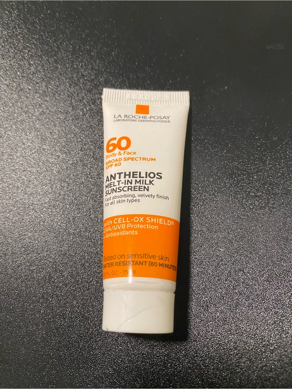 Anthelios Melt-In Milk Sunscreen SPF 60 — White & Orange